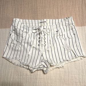 Striped cutoff shorts w/lace up front. Billabong brand. Size 26.